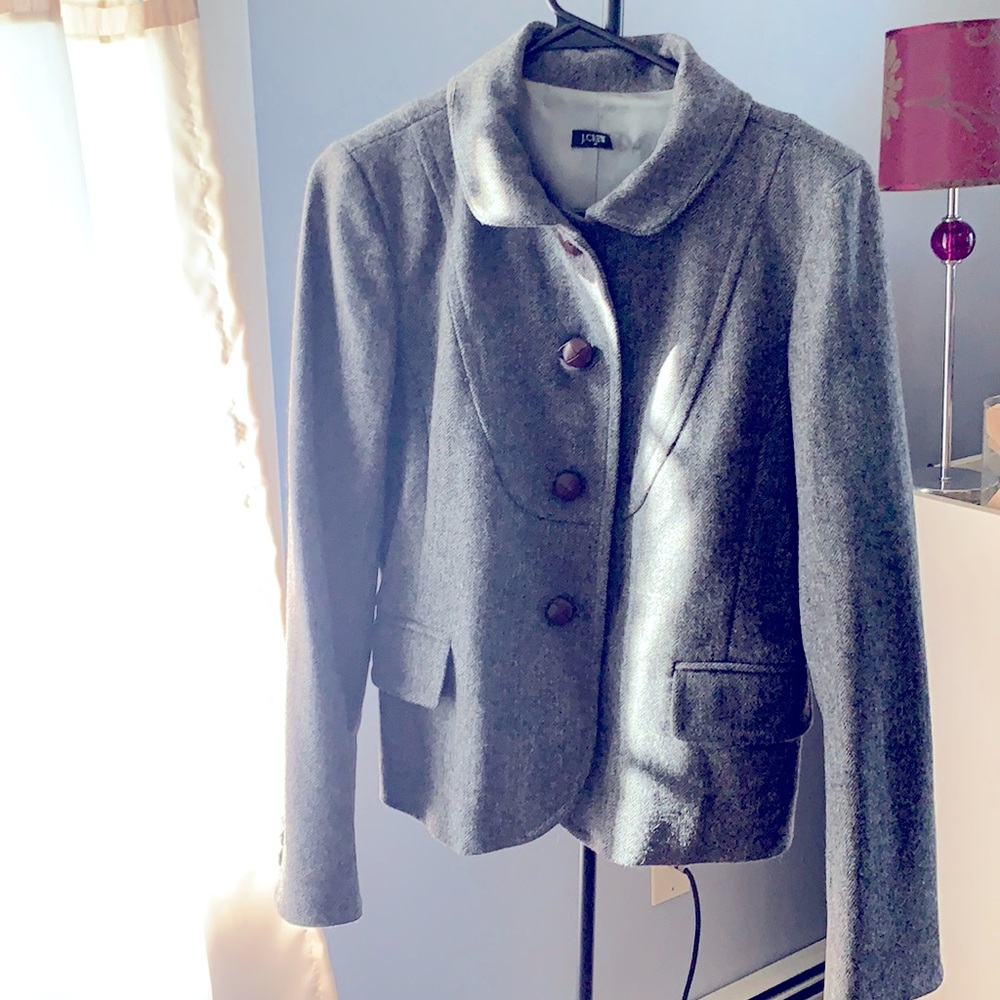 Tweed with brown leather buttons